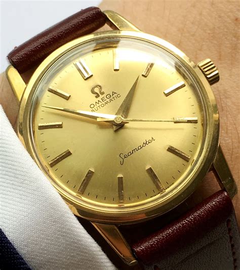 omega seamaster 1956 gold|old omega seamaster watch value.